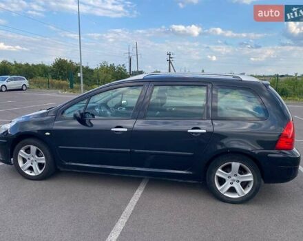 Чорний Пежо 307, об'ємом двигуна 1.59 л та пробігом 303 тис. км за 3900 $, фото 3 на Automoto.ua