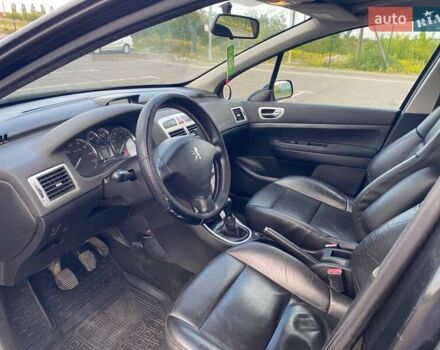 Чорний Пежо 307, об'ємом двигуна 1.59 л та пробігом 303 тис. км за 3900 $, фото 5 на Automoto.ua