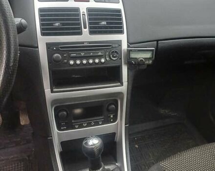 Черный Пежо 307, объемом двигателя 1.6 л и пробегом 264 тыс. км за 5000 $, фото 7 на Automoto.ua