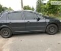 Чорний Пежо 307, об'ємом двигуна 1.4 л та пробігом 308 тис. км за 4000 $, фото 1 на Automoto.ua