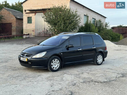 Черный Пежо 307, объемом двигателя 1.6 л и пробегом 202 тыс. км за 3950 $, фото 1 на Automoto.ua