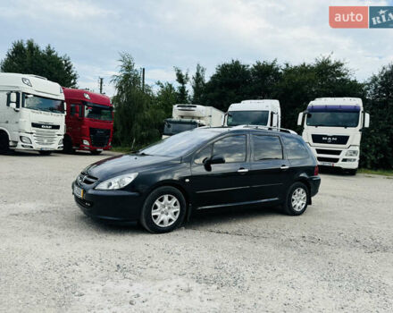 Черный Пежо 307, объемом двигателя 1.6 л и пробегом 204 тыс. км за 4500 $, фото 1 на Automoto.ua