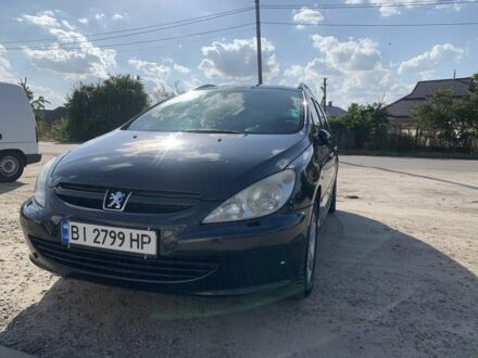 Черный Пежо 307, объемом двигателя 2 л и пробегом 283 тыс. км за 4700 $, фото 1 на Automoto.ua