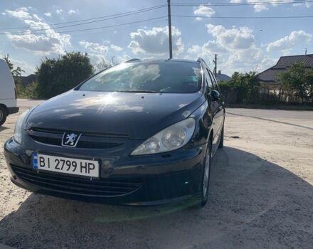 Черный Пежо 307, объемом двигателя 2 л и пробегом 283 тыс. км за 4700 $, фото 1 на Automoto.ua