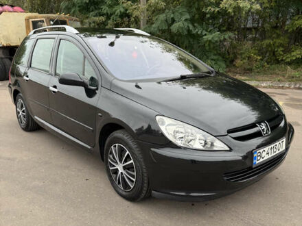 Черный Пежо 307, объемом двигателя 1.59 л и пробегом 300 тыс. км за 3700 $, фото 1 на Automoto.ua