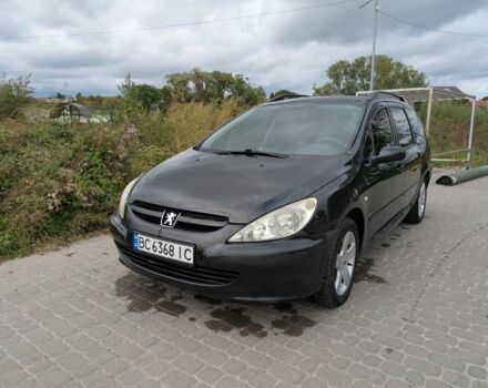 Черный Пежо 307, объемом двигателя 2 л и пробегом 300 тыс. км за 2700 $, фото 1 на Automoto.ua