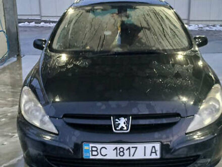 Черный Пежо 307, объемом двигателя 1.6 л и пробегом 293 тыс. км за 4400 $, фото 1 на Automoto.ua