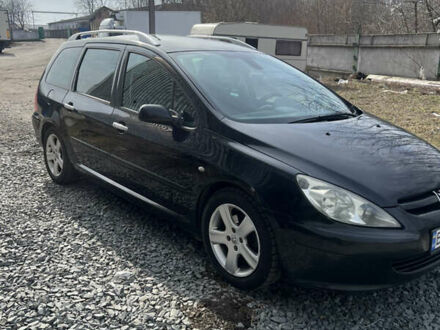 Черный Пежо 307, объемом двигателя 1.56 л и пробегом 270 тыс. км за 4300 $, фото 1 на Automoto.ua