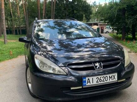 Черный Пежо 307, объемом двигателя 1.6 л и пробегом 350 тыс. км за 3500 $, фото 1 на Automoto.ua