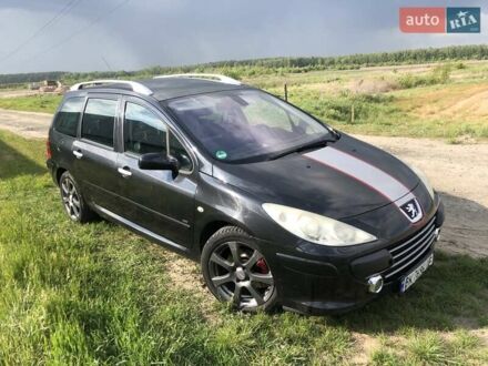 Черный Пежо 307, объемом двигателя 2 л и пробегом 325 тыс. км за 5000 $, фото 1 на Automoto.ua
