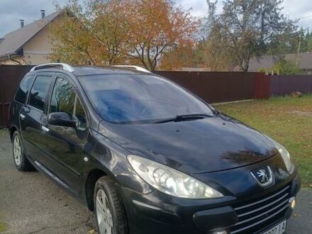 Черный Пежо 307, объемом двигателя 2 л и пробегом 300 тыс. км за 5500 $, фото 1 на Automoto.ua