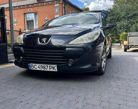 Черный Пежо 307, объемом двигателя 1.59 л и пробегом 325 тыс. км за 3900 $, фото 1 на Automoto.ua