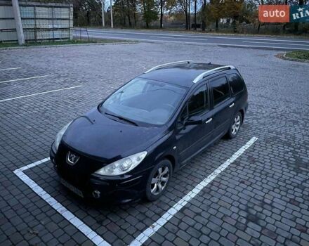 Черный Пежо 307, объемом двигателя 2 л и пробегом 256 тыс. км за 4900 $, фото 1 на Automoto.ua