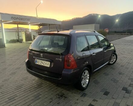 Фиолетовый Пежо 307, объемом двигателя 2 л и пробегом 309 тыс. км за 3000 $, фото 5 на Automoto.ua