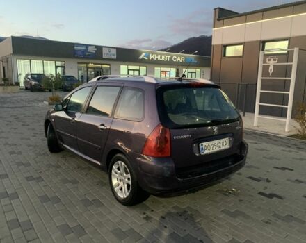 Фиолетовый Пежо 307, объемом двигателя 2 л и пробегом 309 тыс. км за 3000 $, фото 4 на Automoto.ua