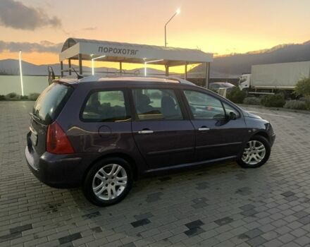 Фиолетовый Пежо 307, объемом двигателя 2 л и пробегом 309 тыс. км за 3000 $, фото 6 на Automoto.ua