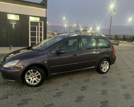 Фиолетовый Пежо 307, объемом двигателя 2 л и пробегом 309 тыс. км за 3000 $, фото 1 на Automoto.ua