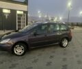 Фиолетовый Пежо 307, объемом двигателя 2 л и пробегом 309 тыс. км за 3000 $, фото 1 на Automoto.ua