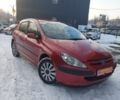 Красный Пежо 307, объемом двигателя 1.4 л и пробегом 220 тыс. км за 2999 $, фото 1 на Automoto.ua