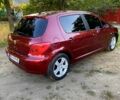 Червоний Пежо 307, об'ємом двигуна 2 л та пробігом 250 тис. км за 3500 $, фото 2 на Automoto.ua