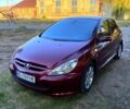 Красный Пежо 307, объемом двигателя 2 л и пробегом 250 тыс. км за 3500 $, фото 1 на Automoto.ua