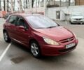 Красный Пежо 307, объемом двигателя 2 л и пробегом 210 тыс. км за 3300 $, фото 1 на Automoto.ua