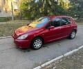 Червоний Пежо 307, об'ємом двигуна 1.6 л та пробігом 210 тис. км за 4200 $, фото 2 на Automoto.ua