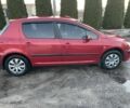 Красный Пежо 307, объемом двигателя 1.4 л и пробегом 284 тыс. км за 4000 $, фото 1 на Automoto.ua