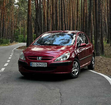 Красный Пежо 307, объемом двигателя 1.4 л и пробегом 199 тыс. км за 2900 $, фото 2 на Automoto.ua