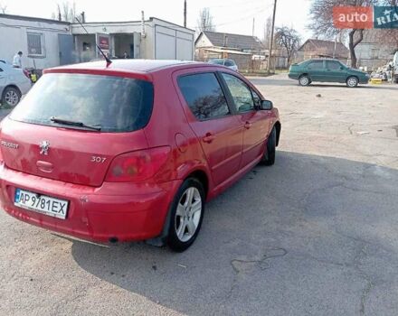 Червоний Пежо 307, об'ємом двигуна 2 л та пробігом 230 тис. км за 3200 $, фото 6 на Automoto.ua