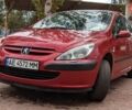 Червоний Пежо 307, об'ємом двигуна 1.4 л та пробігом 185 тис. км за 3950 $, фото 5 на Automoto.ua