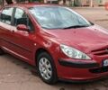 Червоний Пежо 307, об'ємом двигуна 1.4 л та пробігом 185 тис. км за 3950 $, фото 3 на Automoto.ua