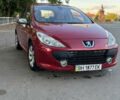 Красный Пежо 307, объемом двигателя 2 л и пробегом 127 тыс. км за 4200 $, фото 1 на Automoto.ua