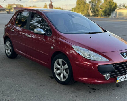 Красный Пежо 307, объемом двигателя 2 л и пробегом 127 тыс. км за 4200 $, фото 1 на Automoto.ua