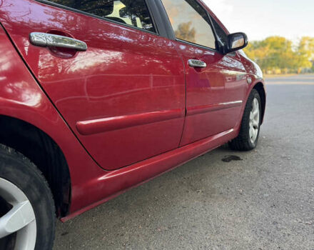 Красный Пежо 307, объемом двигателя 2 л и пробегом 127 тыс. км за 4200 $, фото 3 на Automoto.ua