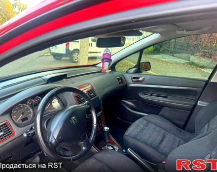 Красный Пежо 307, объемом двигателя 2 л и пробегом 215 тыс. км за 4299 $, фото 8 на Automoto.ua