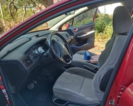 Красный Пежо 307, объемом двигателя 2 л и пробегом 159 тыс. км за 5000 $, фото 7 на Automoto.ua