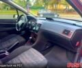 Красный Пежо 307, объемом двигателя 2 л и пробегом 215 тыс. км за 4299 $, фото 6 на Automoto.ua
