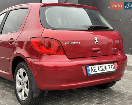 Красный Пежо 307, объемом двигателя 2 л и пробегом 189 тыс. км за 4500 $, фото 5 на Automoto.ua