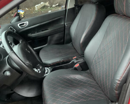 Красный Пежо 307, объемом двигателя 2 л и пробегом 204 тыс. км за 4200 $, фото 6 на Automoto.ua