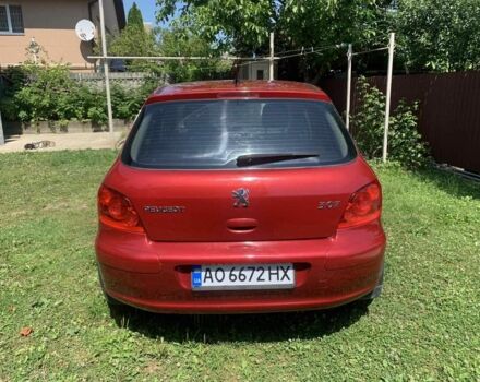 Красный Пежо 307, объемом двигателя 2 л и пробегом 206 тыс. км за 4400 $, фото 1 на Automoto.ua