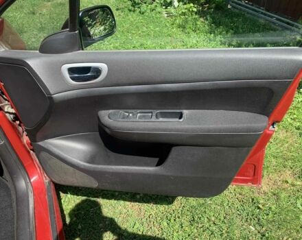 Красный Пежо 307, объемом двигателя 2 л и пробегом 206 тыс. км за 4400 $, фото 5 на Automoto.ua