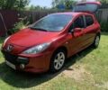 Красный Пежо 307, объемом двигателя 2 л и пробегом 205 тыс. км за 5100 $, фото 1 на Automoto.ua