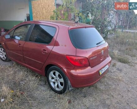 Красный Пежо 307, объемом двигателя 2 л и пробегом 275 тыс. км за 4500 $, фото 6 на Automoto.ua