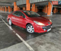 Красный Пежо 307, объемом двигателя 2 л и пробегом 190 тыс. км за 4999 $, фото 1 на Automoto.ua