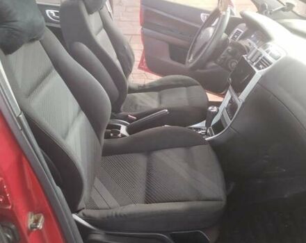 Красный Пежо 307, объемом двигателя 2 л и пробегом 269 тыс. км за 4700 $, фото 5 на Automoto.ua