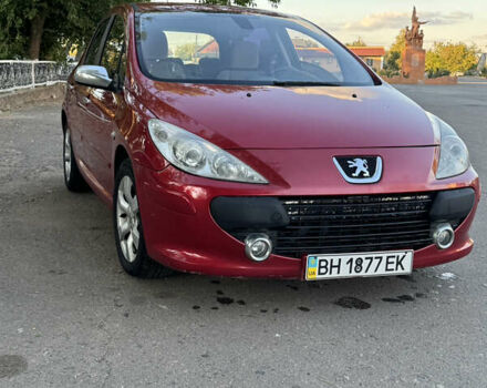 Красный Пежо 307, объемом двигателя 2 л и пробегом 127 тыс. км за 4200 $, фото 1 на Automoto.ua