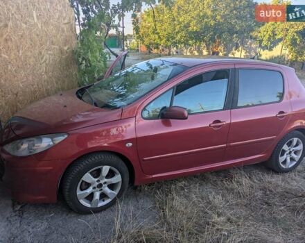 Красный Пежо 307, объемом двигателя 2 л и пробегом 275 тыс. км за 4500 $, фото 1 на Automoto.ua
