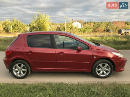 Красный Пежо 307, объемом двигателя 2 л и пробегом 246 тыс. км за 4500 $, фото 1 на Automoto.ua