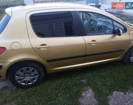Желтый Пежо 307, объемом двигателя 1.59 л и пробегом 230 тыс. км за 3700 $, фото 3 на Automoto.ua